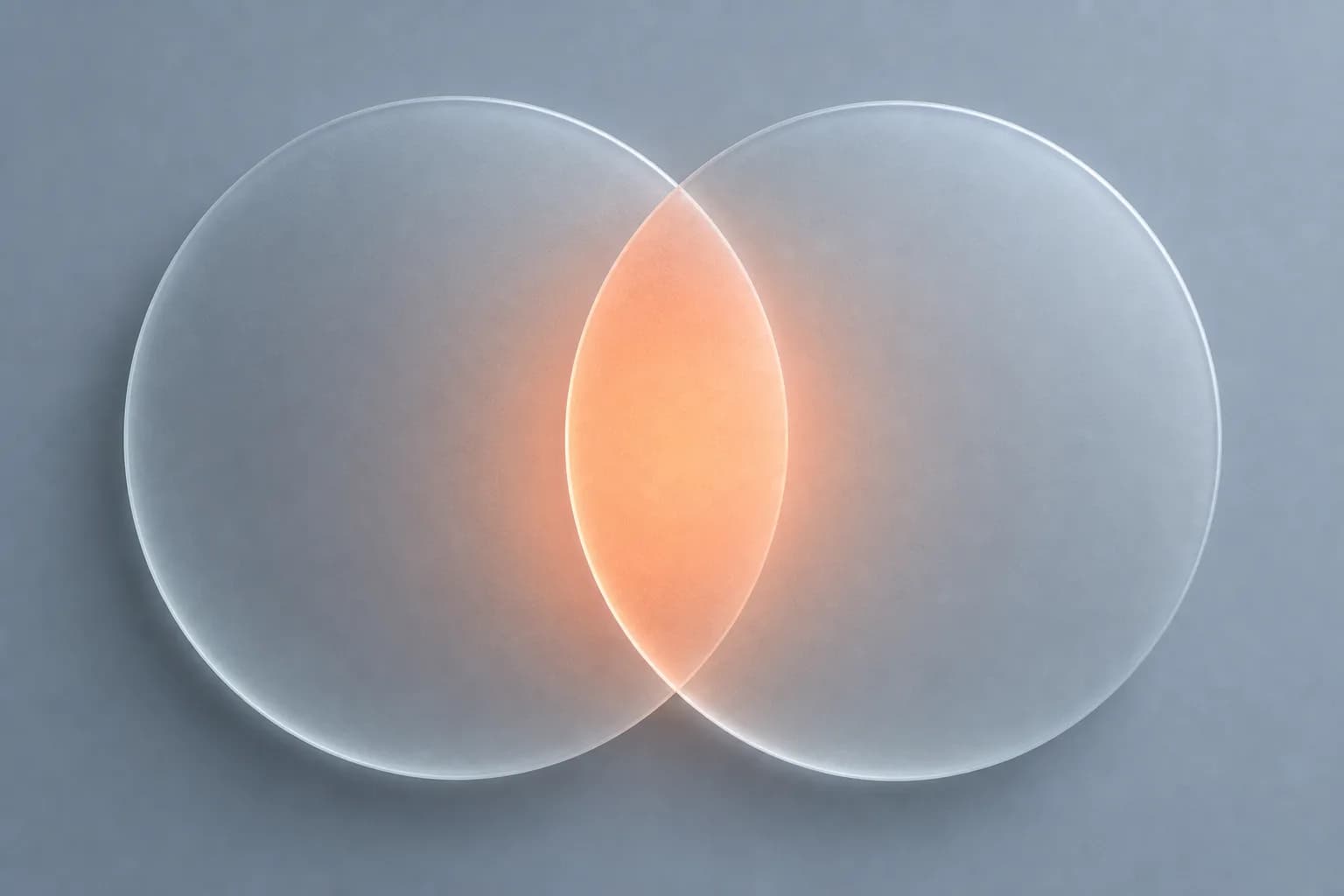 Two overlapping frosted glass circles glowing coral