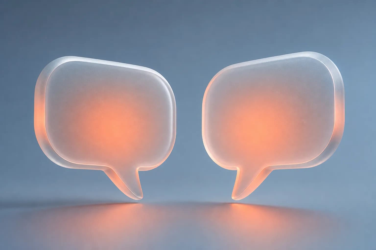 Two frosted glass speech bubbles in conversation